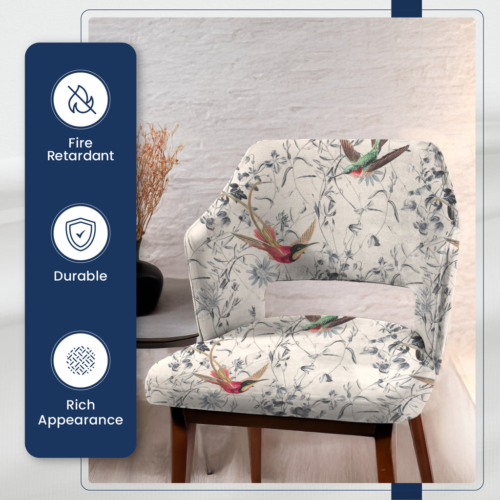 Chair upholstered in printed velvet fabric with a detailed Hummingbird print, offering a stylish finish.