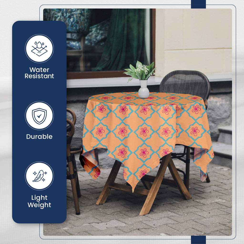  Table covered with ethnic design fabric, demonstrating its versatility for outdoor dining.