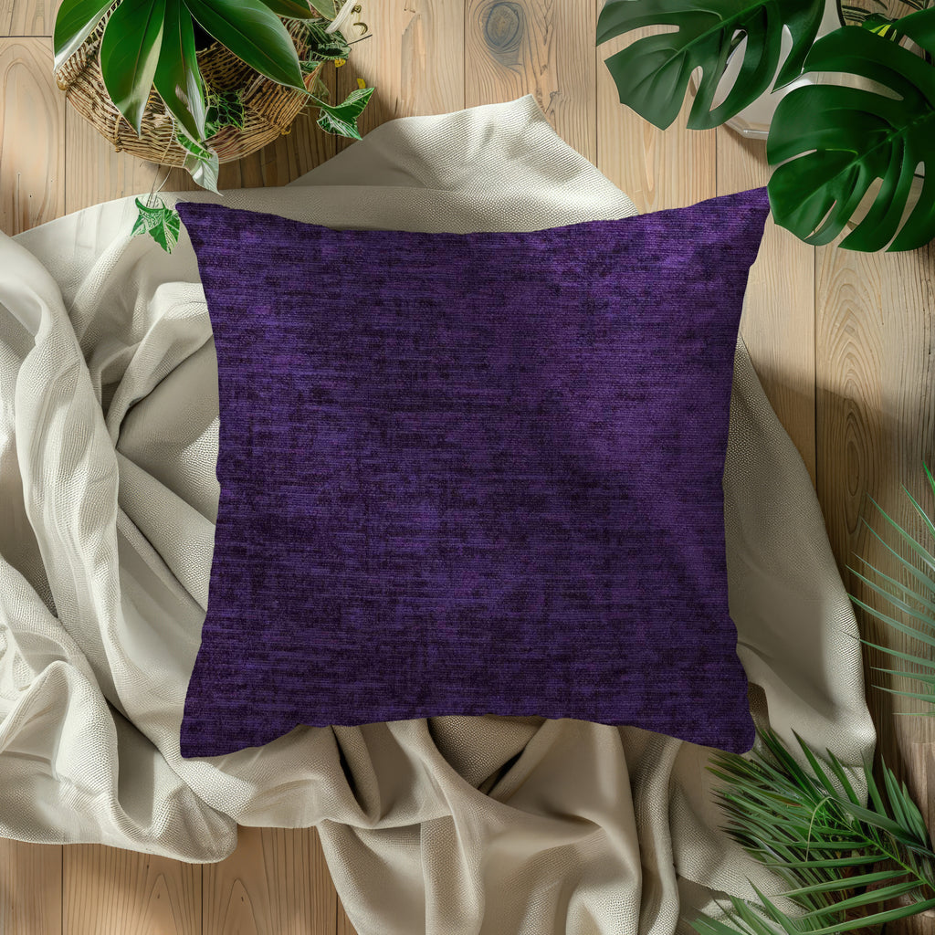 Chenille velvet cushions in purple, showcasing the soft texture and deep color.