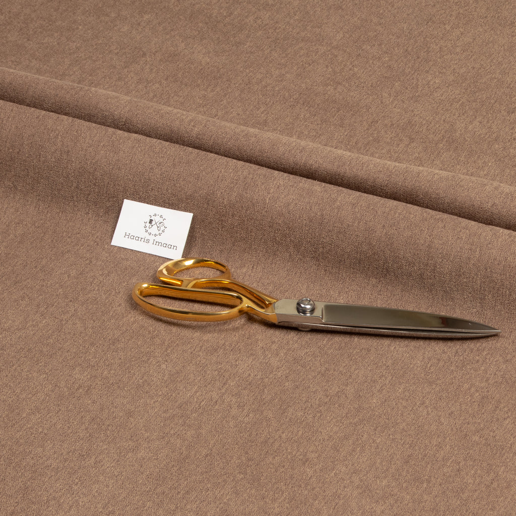 Close-up of Wool Effect Upholstery Fabric in Mocha, highlighting its soft wool-like texture.